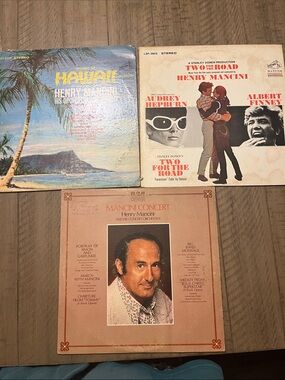 Henry Mancini Vinyl Records with Pink and Black Accents